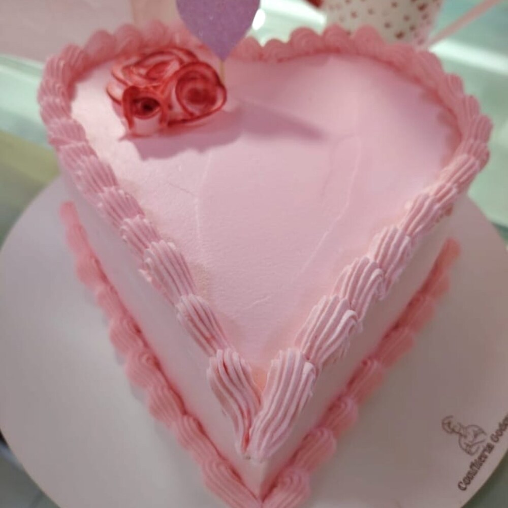 Torta corazón rosada